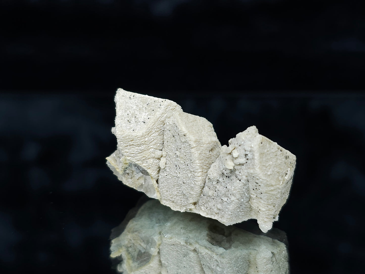#88032 Hematite on cream-white Calcite pseudomorph after triple Combined form Calcite