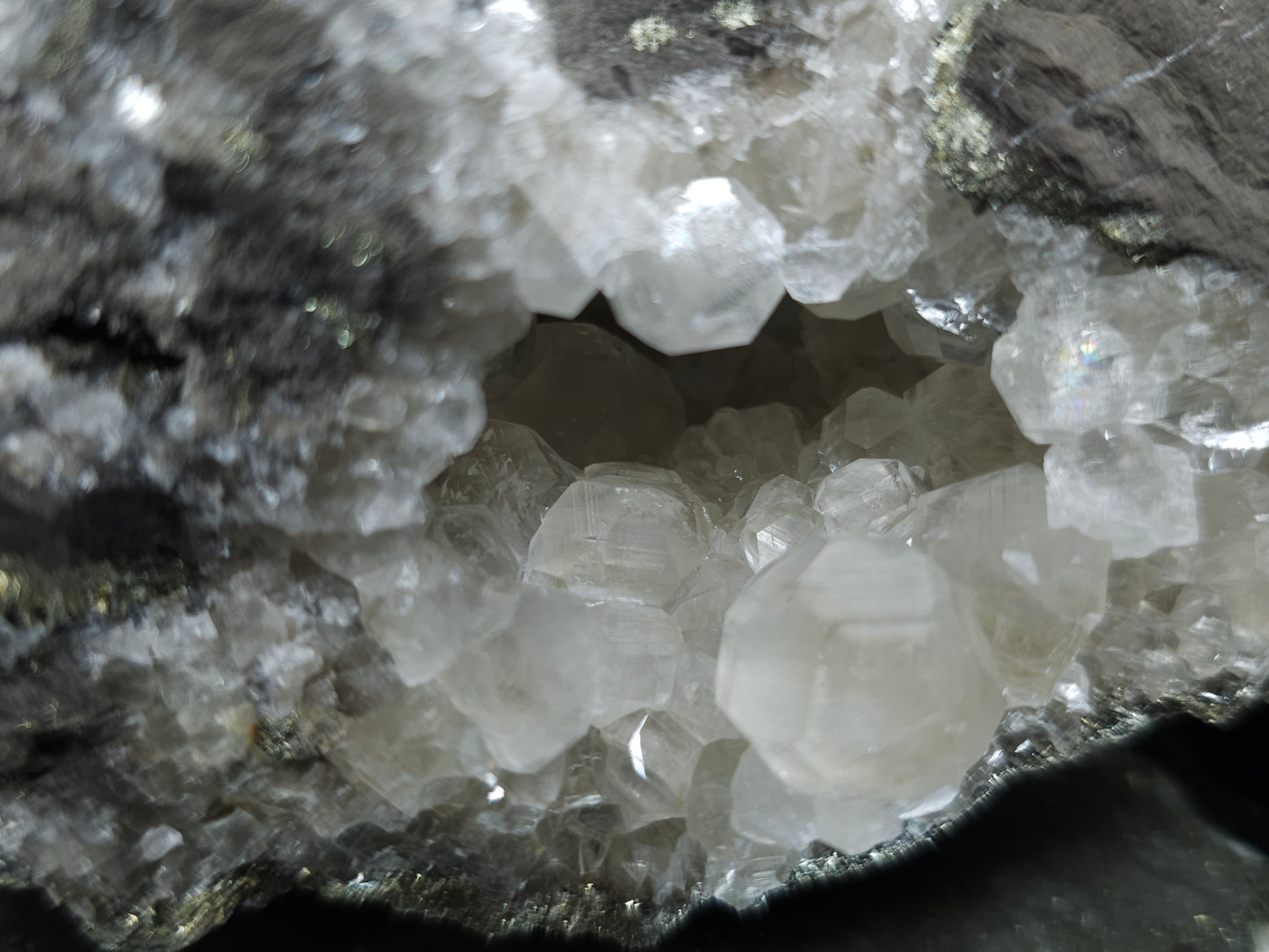 #33122 Super clear Nailhead Spar Calcite geode with Chalcopyrite ore and multiple small fossils in the matrix
