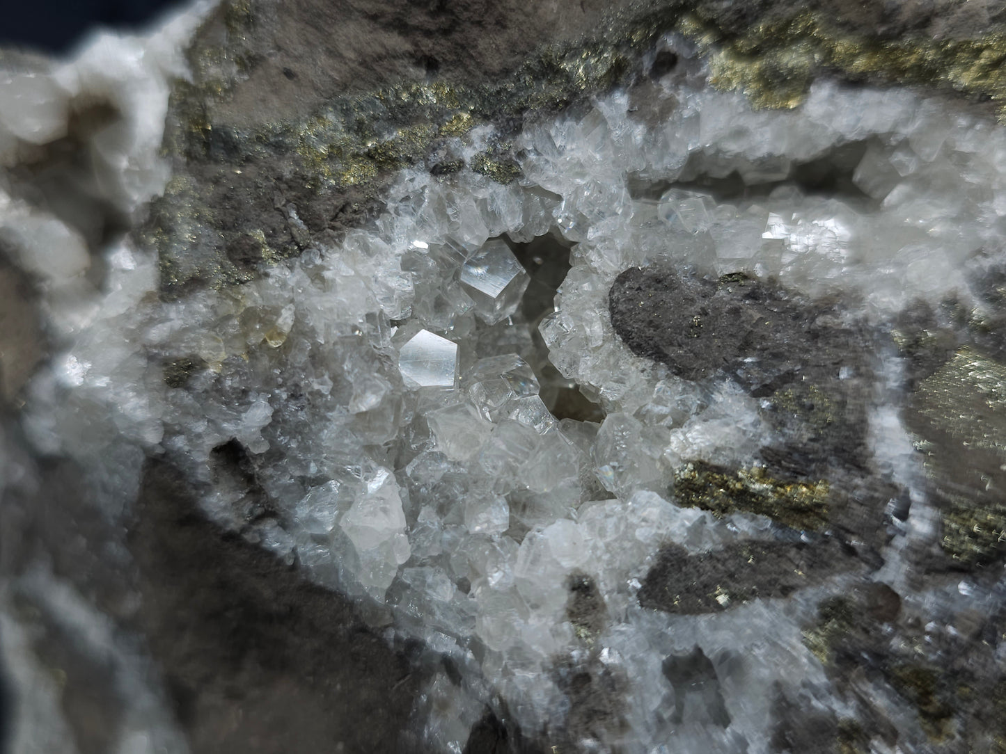 #33122 Super clear Nailhead Spar Calcite geode with Chalcopyrite ore and multiple small fossils in the matrix