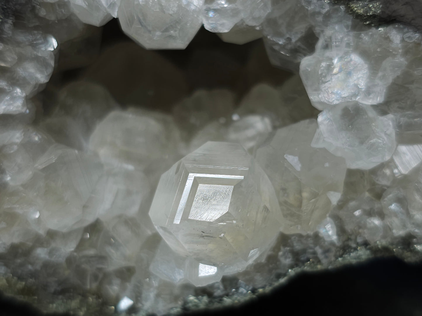 #33122 Super clear Nailhead Spar Calcite geode with Chalcopyrite ore and multiple small fossils in the matrix