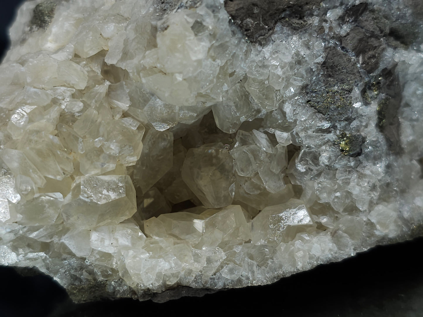 #33122 Super clear Nailhead Spar Calcite geode with Chalcopyrite ore and multiple small fossils in the matrix