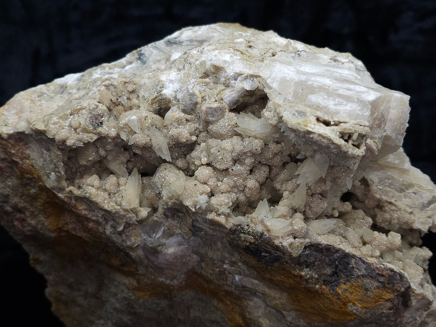 #10030 Hematite and Dogtooth Spar Calcite on white Calcite pseudomorph after Calcite formation