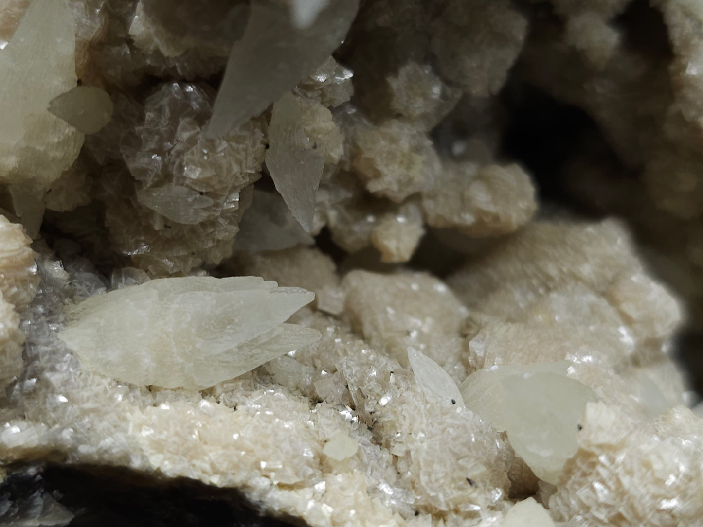 #10030 Hematite and Dogtooth Spar Calcite on white Calcite pseudomorph after Calcite formation