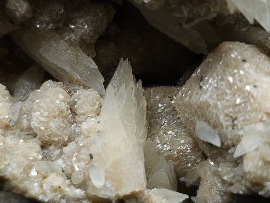 #10030 Hematite and Dogtooth Spar Calcite on white Calcite pseudomorph after Calcite formation