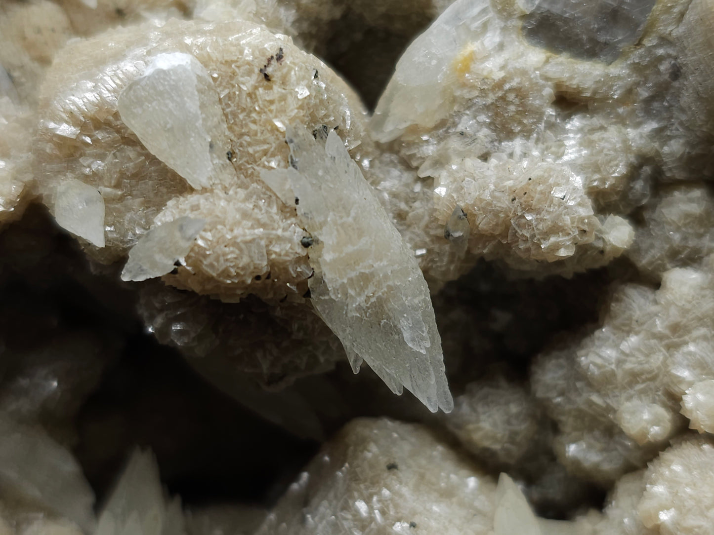 #10030 Hematite and Dogtooth Spar Calcite on white Calcite pseudomorph after Calcite formation