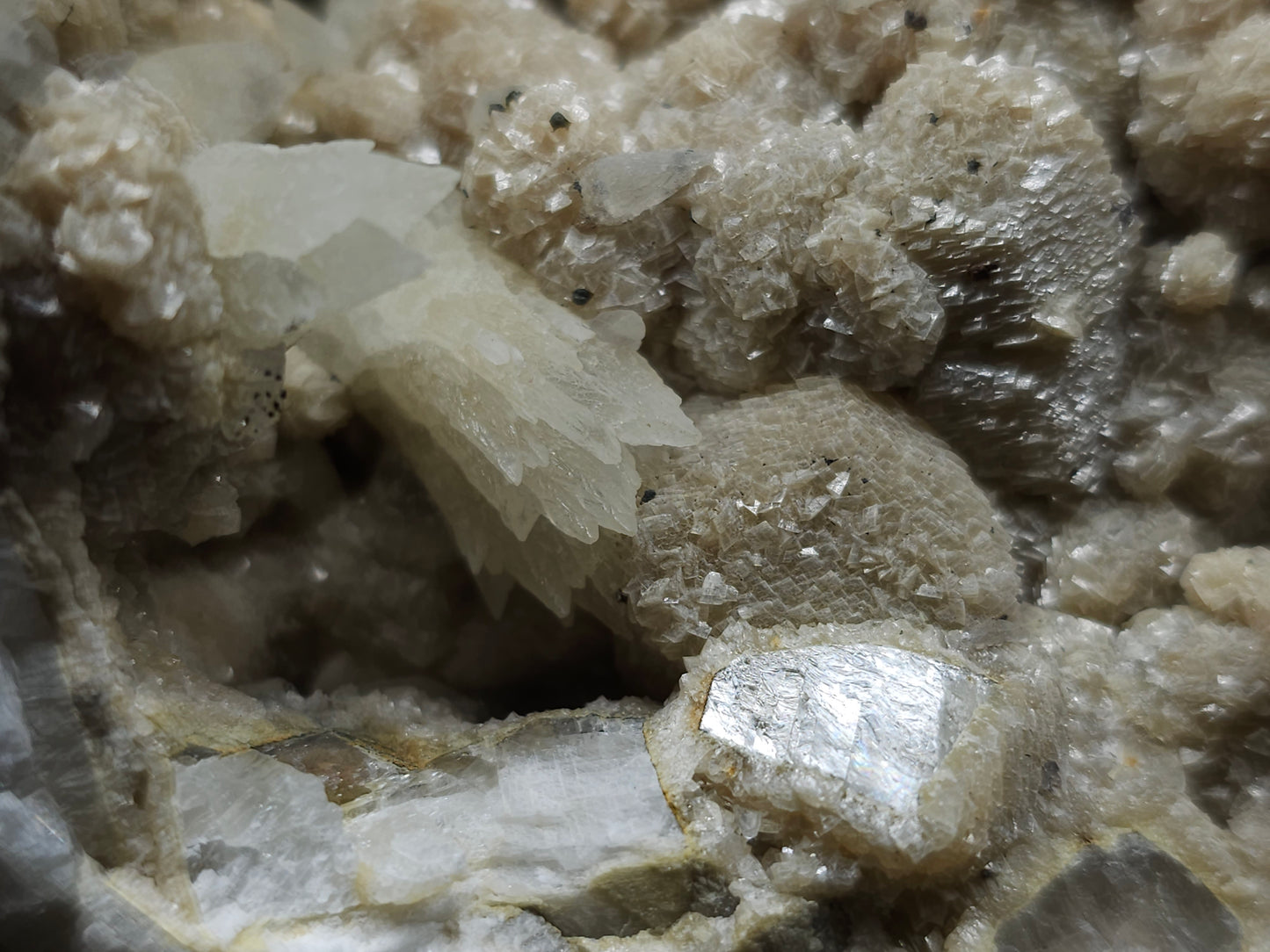 #10030 Hematite and Dogtooth Spar Calcite on white Calcite pseudomorph after Calcite formation