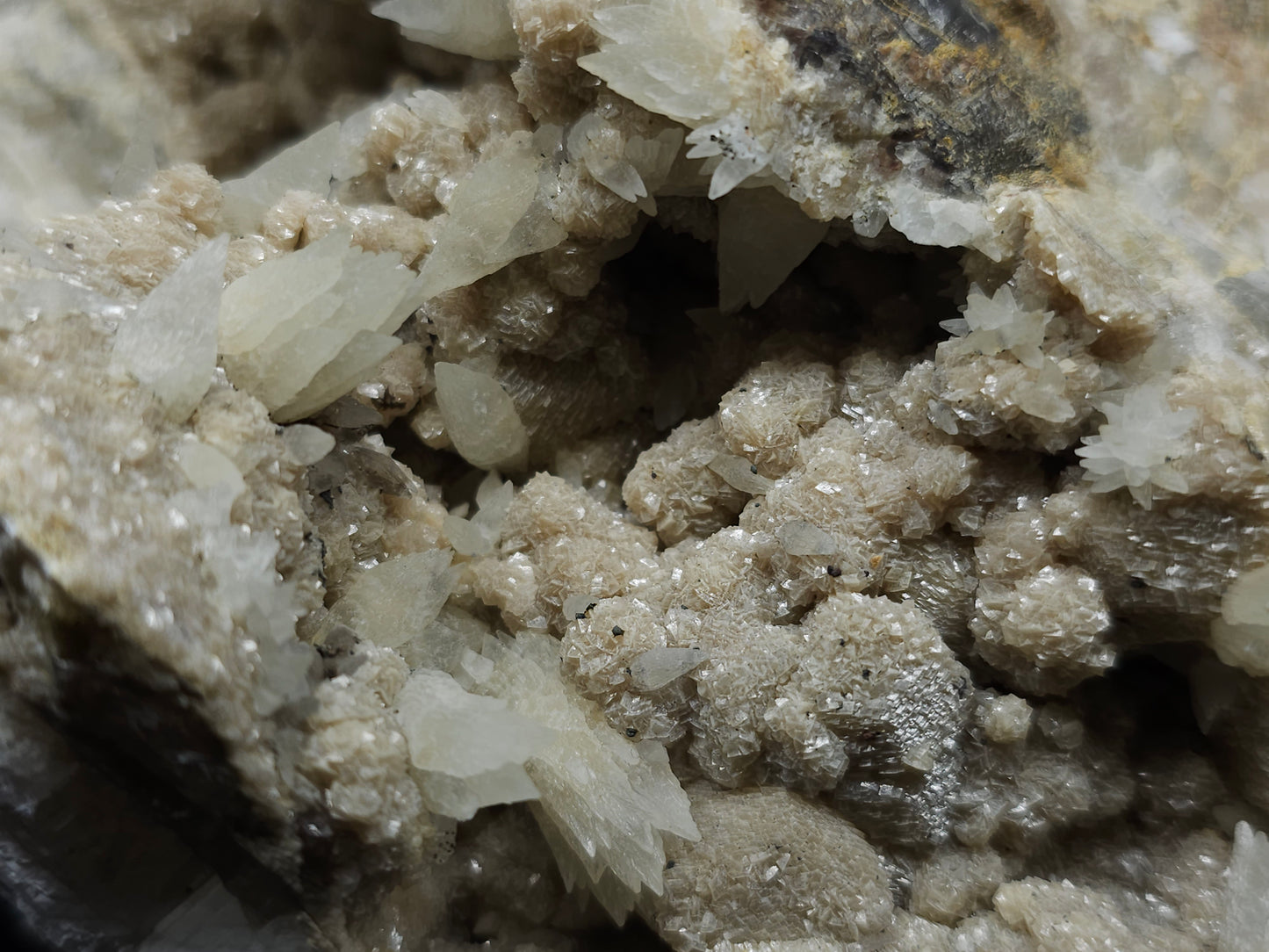 #10030 Hematite and Dogtooth Spar Calcite on white Calcite pseudomorph after Calcite formation