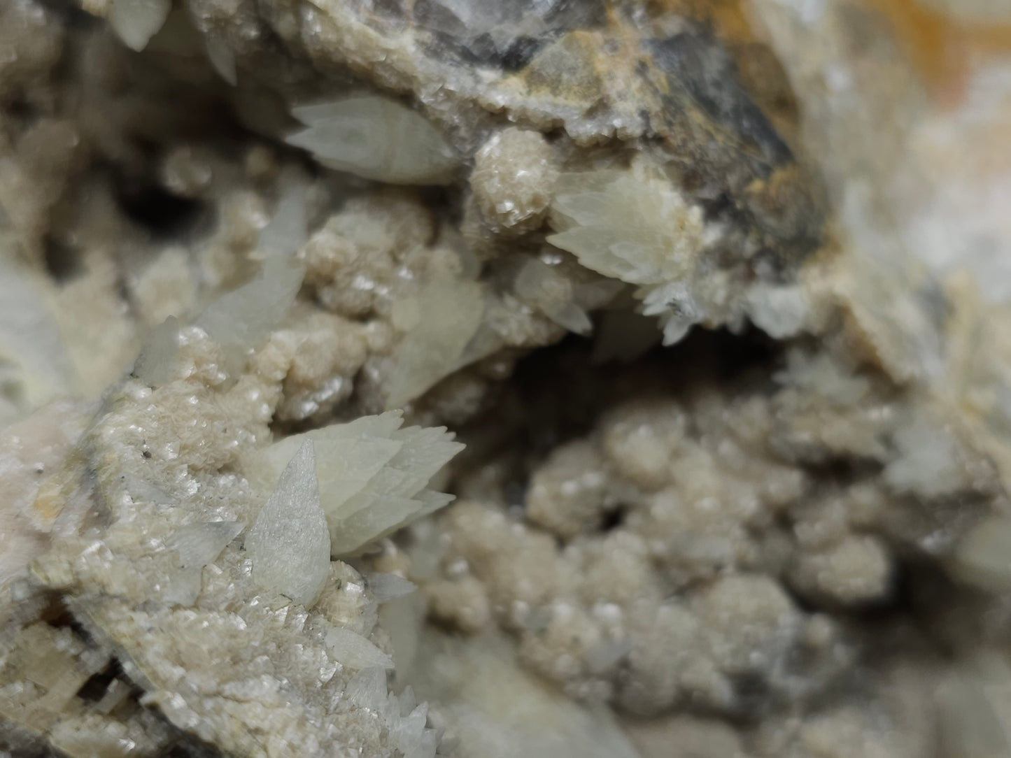 #10030 Hematite and Dogtooth Spar Calcite on white Calcite pseudomorph after Calcite formation