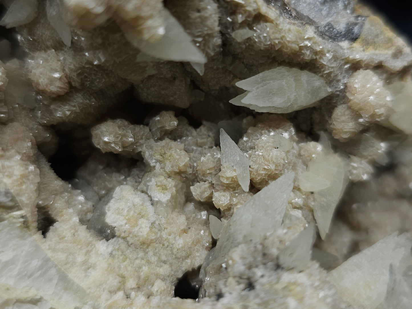 #10030 Hematite and Dogtooth Spar Calcite on white Calcite pseudomorph after Calcite formation