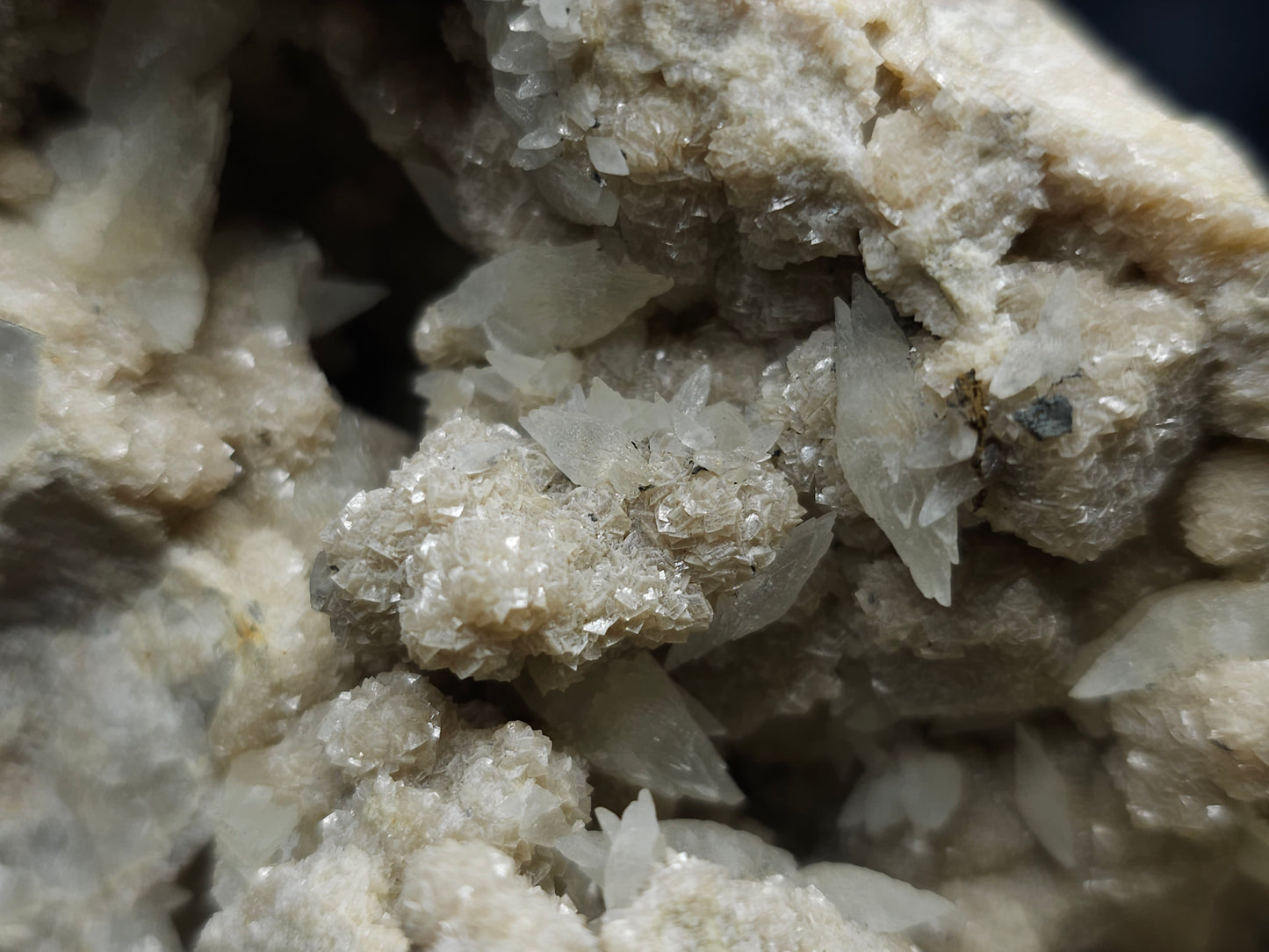 #10030 Hematite and Dogtooth Spar Calcite on white Calcite pseudomorph after Calcite formation