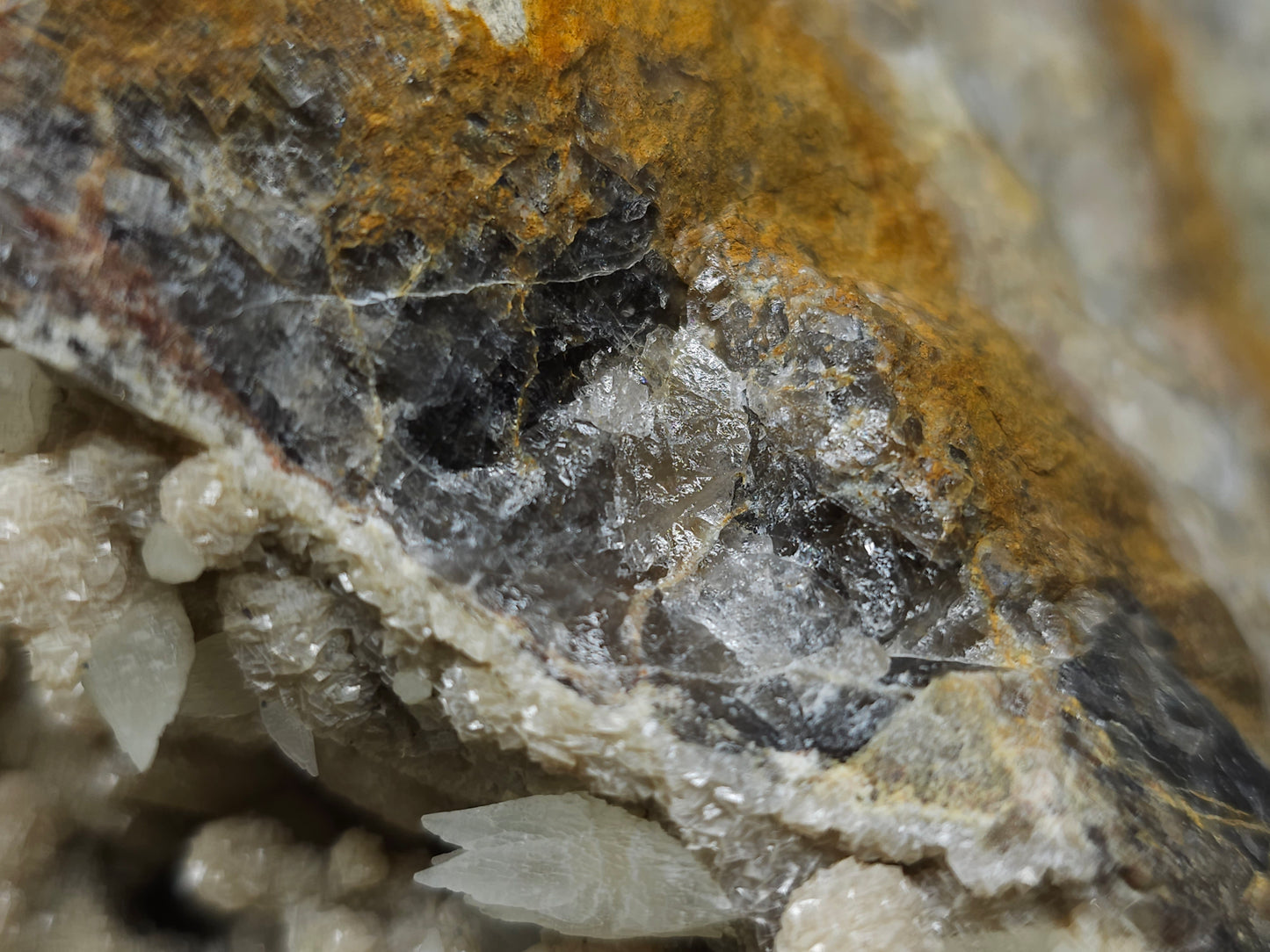 #10030 Hematite and Dogtooth Spar Calcite on white Calcite pseudomorph after Calcite formation