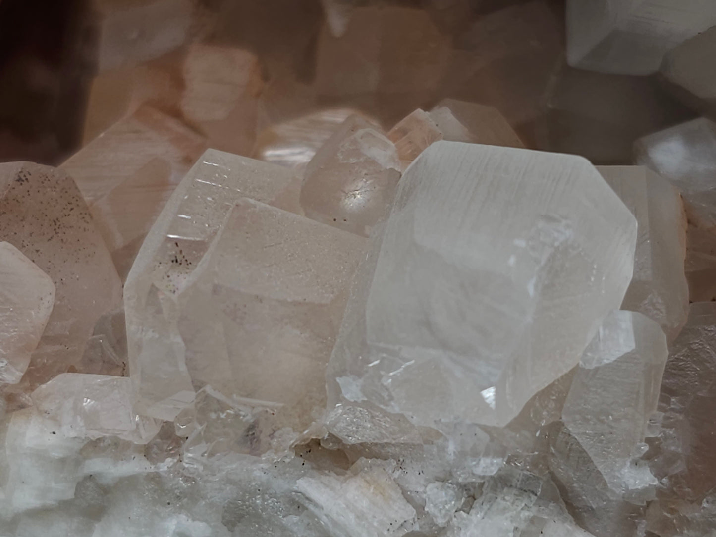 #11072 White and clear Combined form Calcite with Hematite inclusions on matrix