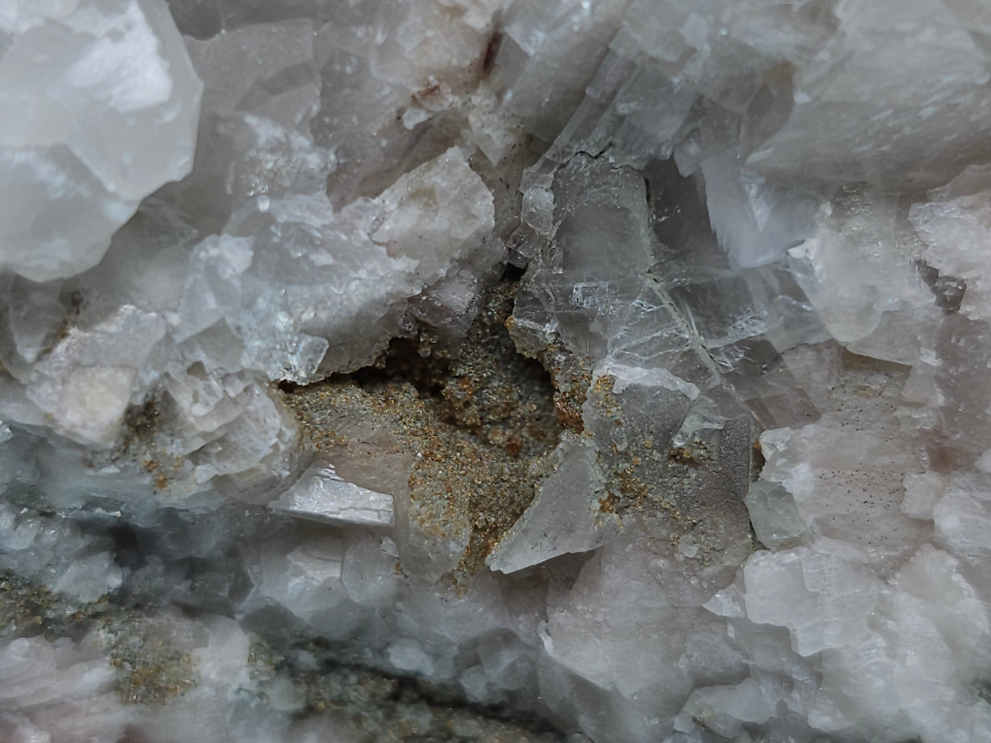 #11072 White and clear Combined form Calcite with Hematite inclusions on matrix