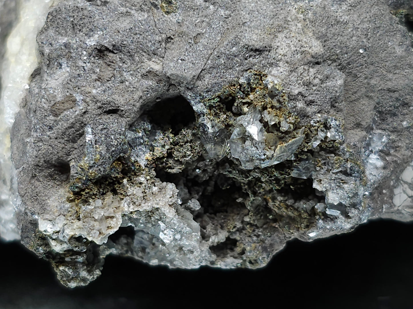 #55022 Peacock ore Chalcopyrite, fossil flower with Chalcopyrite coating, Calcite lines and small Baryte pieces, on matrix that have small fossil in it