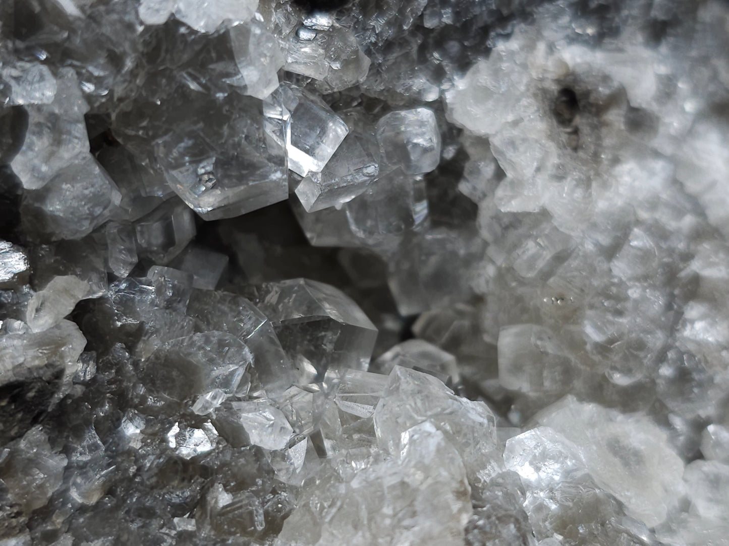#33129 Super clear Nailhead Spar Calcite geode with Chalcopyrite ore and multiple small fossils in the matrix