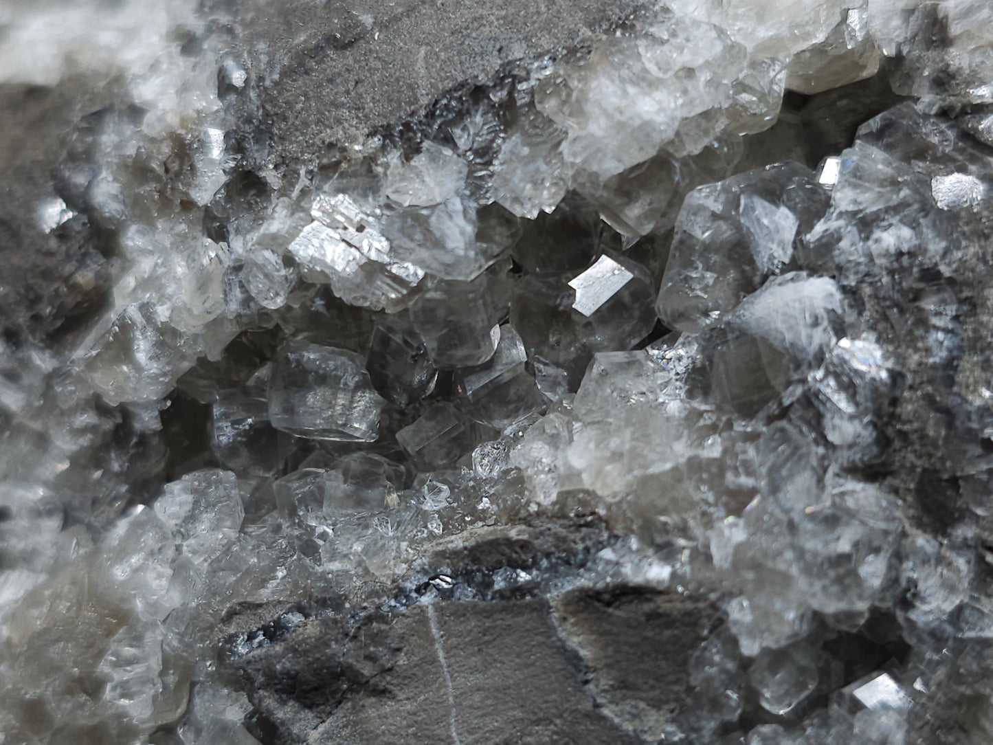 #33129 Super clear Nailhead Spar Calcite geode with Chalcopyrite ore and multiple small fossils in the matrix