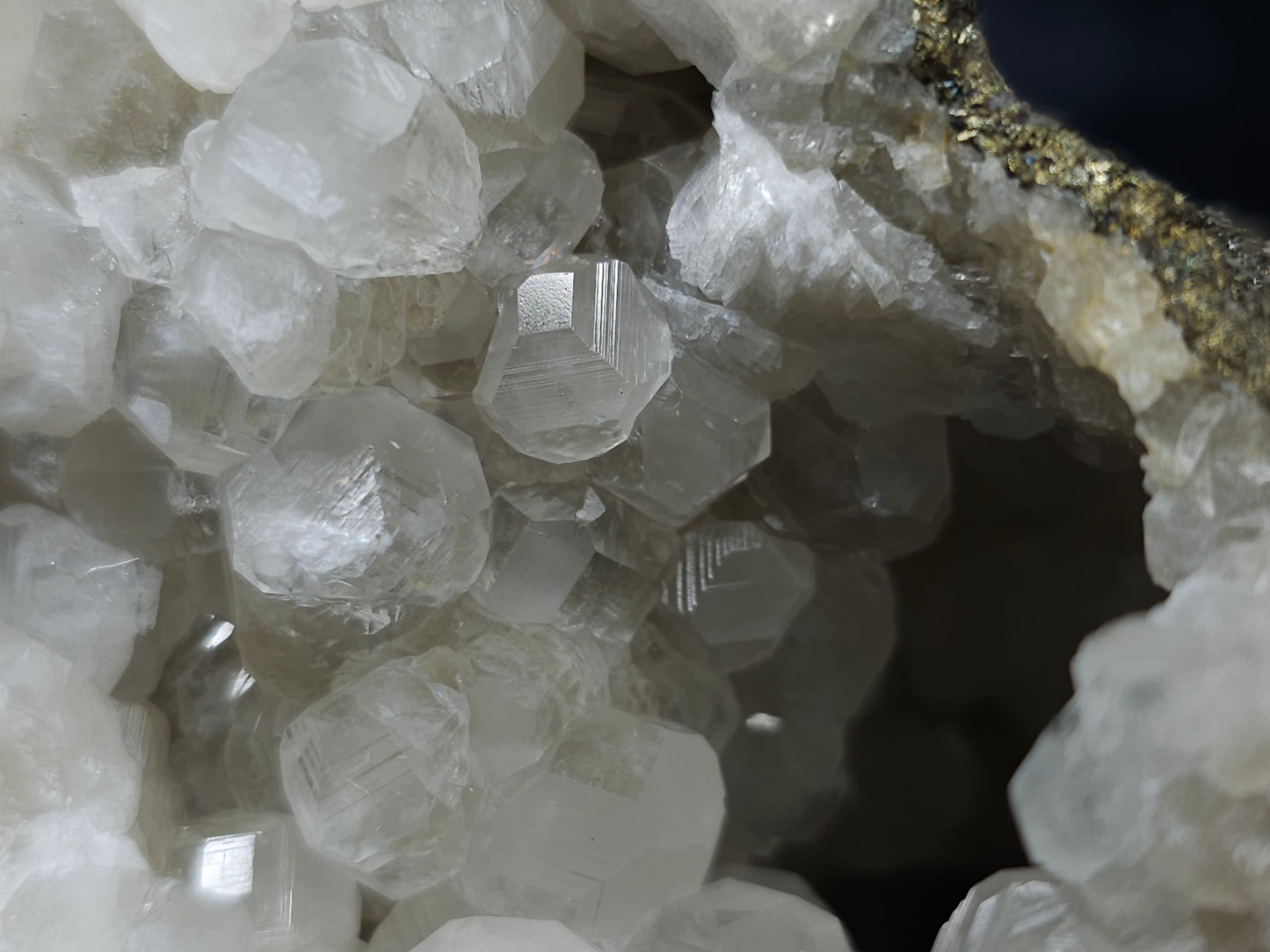 #33127 Super clear Nailhead Spar Calcite geode with Chalcopyrite ore and multiple small fossils in the matrix