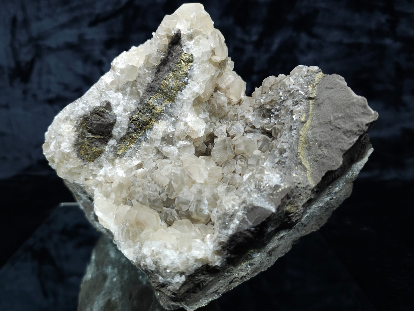 #33127 Super clear Nailhead Spar Calcite geode with Chalcopyrite ore and multiple small fossils in the matrix