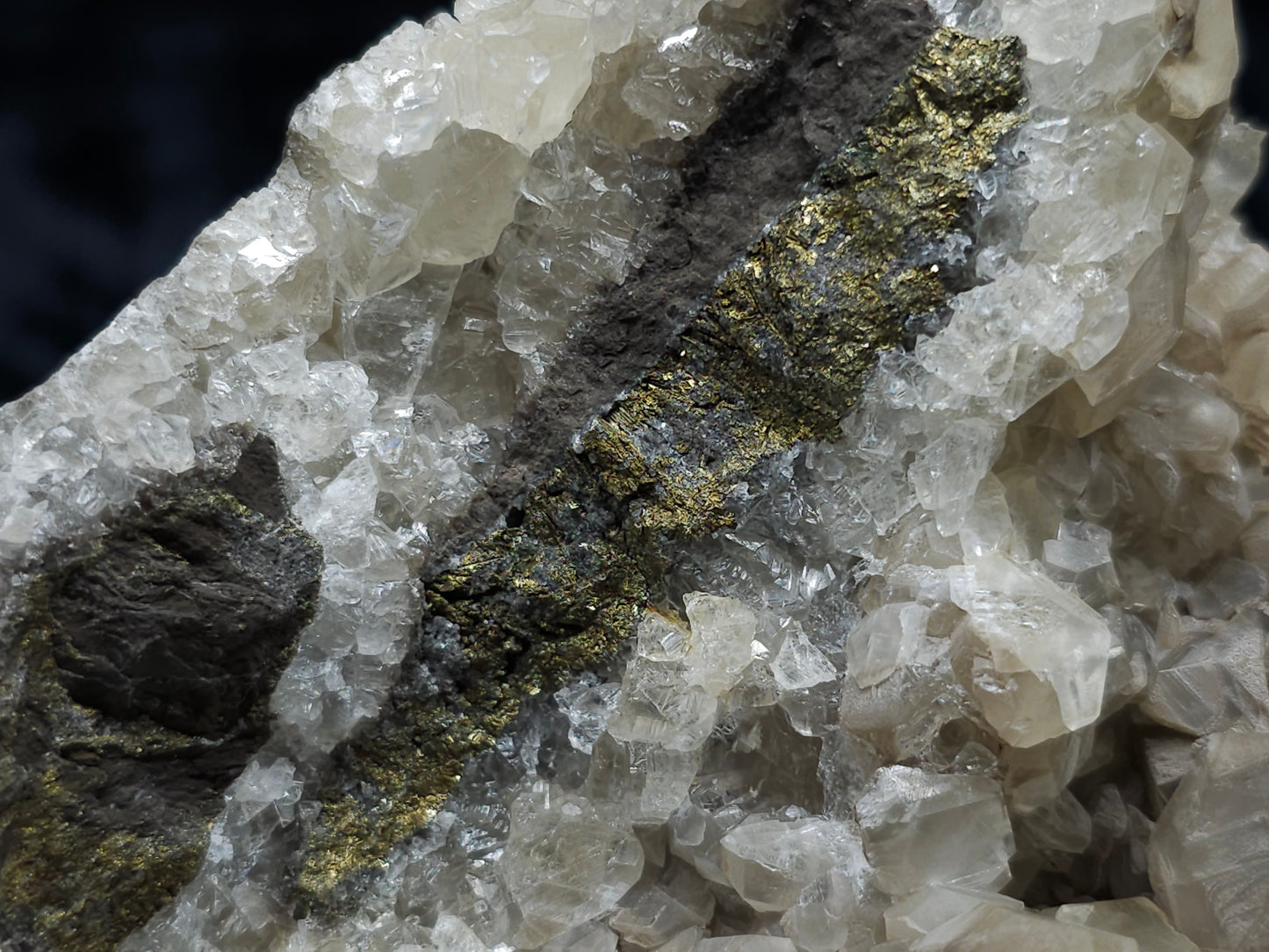 #33127 Super clear Nailhead Spar Calcite geode with Chalcopyrite ore and multiple small fossils in the matrix