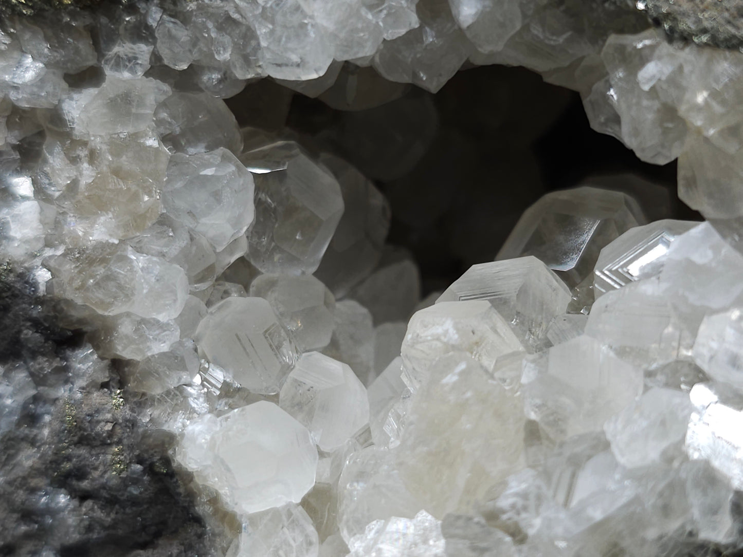 #33127 Super clear Nailhead Spar Calcite geode with Chalcopyrite ore and multiple small fossils in the matrix