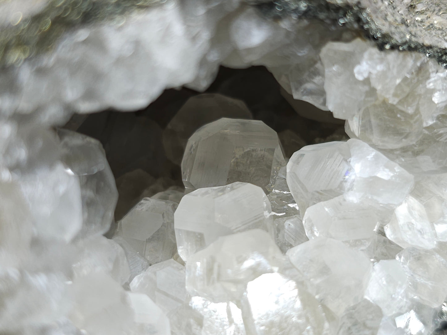 #33127 Super clear Nailhead Spar Calcite geode with Chalcopyrite ore and multiple small fossils in the matrix
