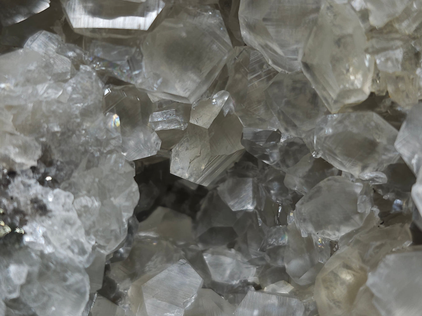 #33130 Super clear Nailhead Spar Calcite geode with Chalcopyrite ore and multiple small fossils in the matrix