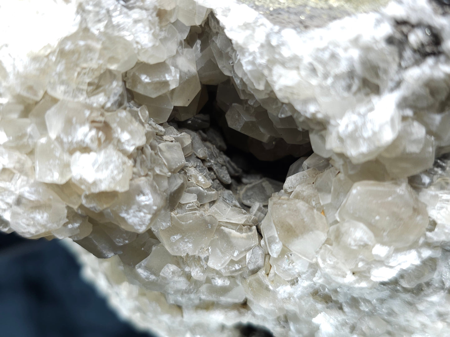 #33130 Super clear Nailhead Spar Calcite geode with Chalcopyrite ore and multiple small fossils in the matrix