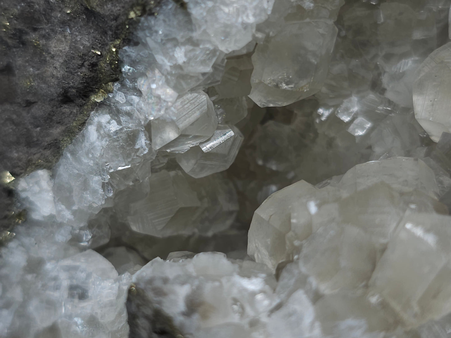 #33133 Super clear Nailhead Spar Calcite geode with Chalcopyrite ore and multiple small fossils in the matrix