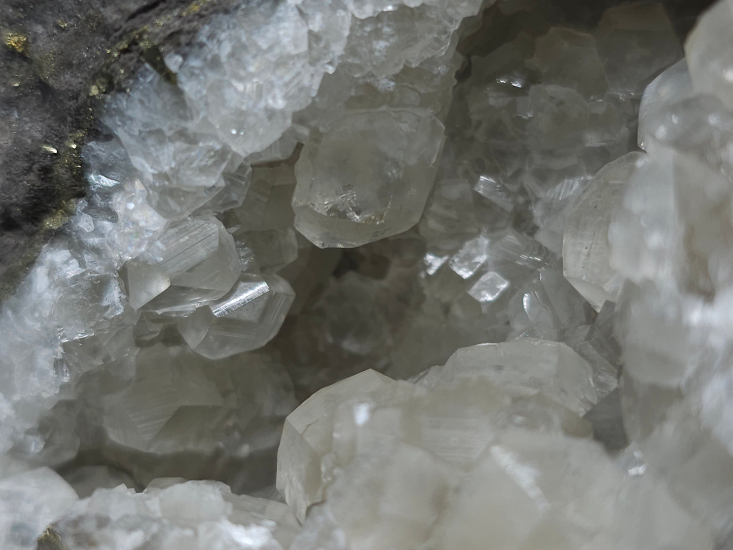 #33133 Super clear Nailhead Spar Calcite geode with Chalcopyrite ore and multiple small fossils in the matrix