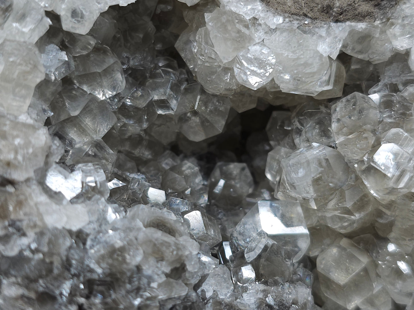 #33131 Super clear Nailhead Spar Calcite geode with Chalcopyrite ore and multiple small fossils in the matrix