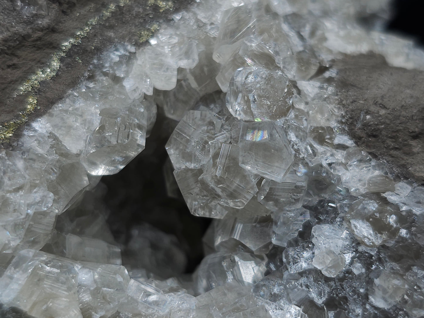 #33146 Super clear Nailhead Spar Calcite geode with Chalcopyrite ore and multiple small fossils in the matrix