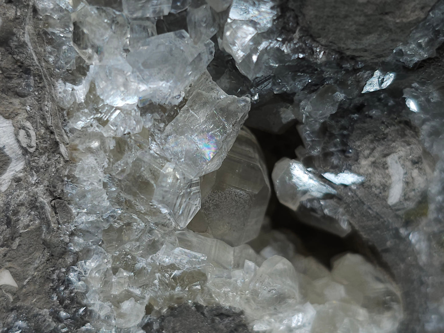 #33150 Super clear Nailhead Spar Calcite geode with Chalcopyrite ore and multiple small fossils in the matrix
