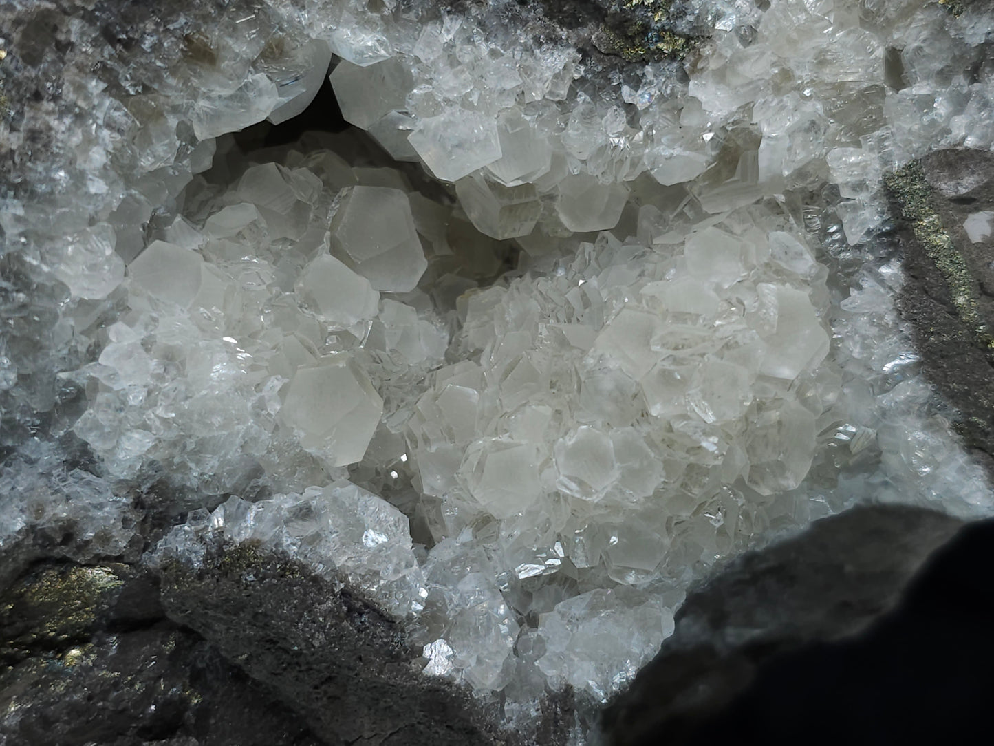 #33145 Super clear Nailhead Spar Calcite geode with Chalcopyrite ore and multiple small fossils in the matrix
