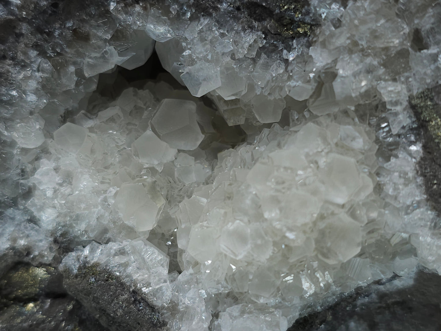 #33145 Super clear Nailhead Spar Calcite geode with Chalcopyrite ore and multiple small fossils in the matrix