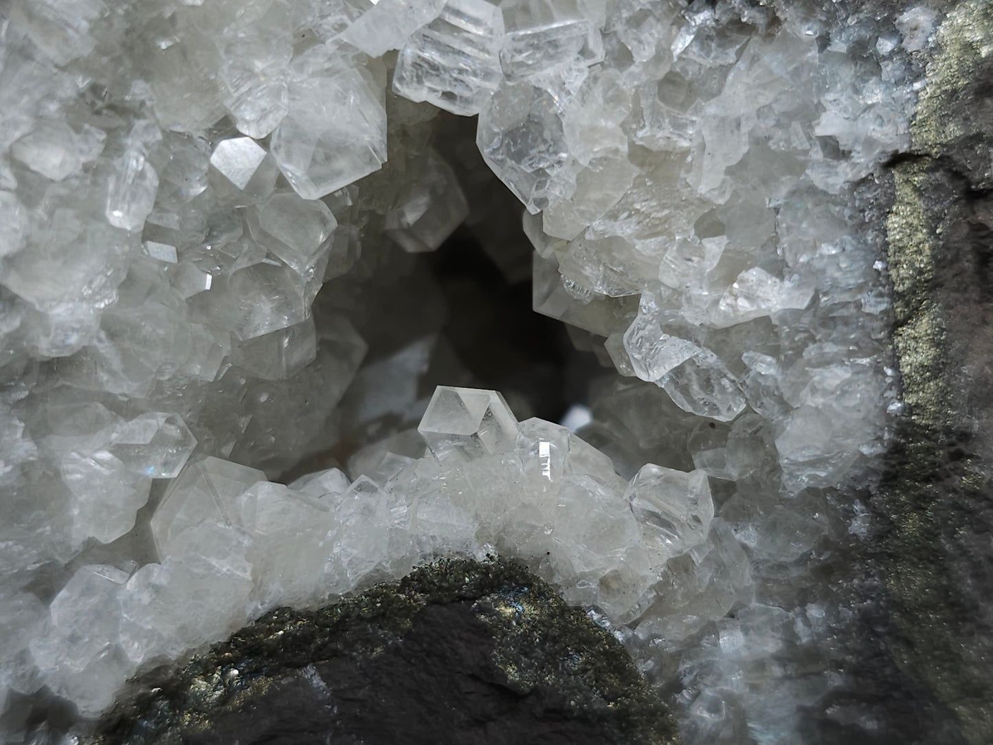 #33145 Super clear Nailhead Spar Calcite geode with Chalcopyrite ore and multiple small fossils in the matrix
