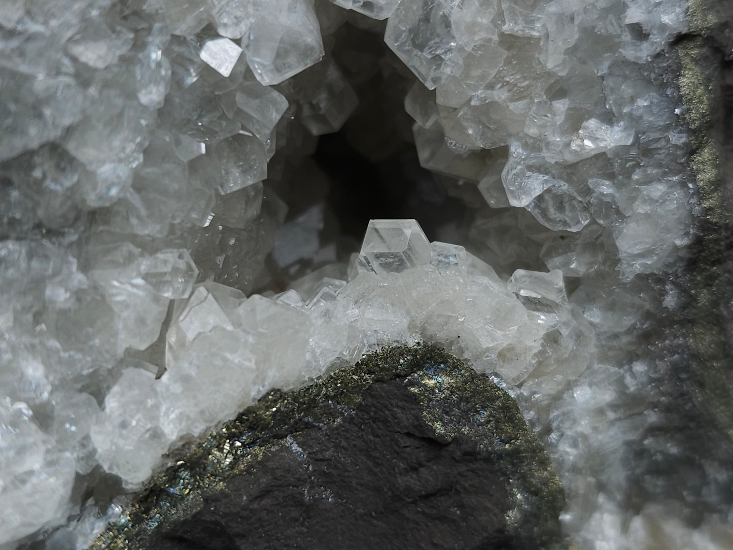 #33145 Super clear Nailhead Spar Calcite geode with Chalcopyrite ore and multiple small fossils in the matrix