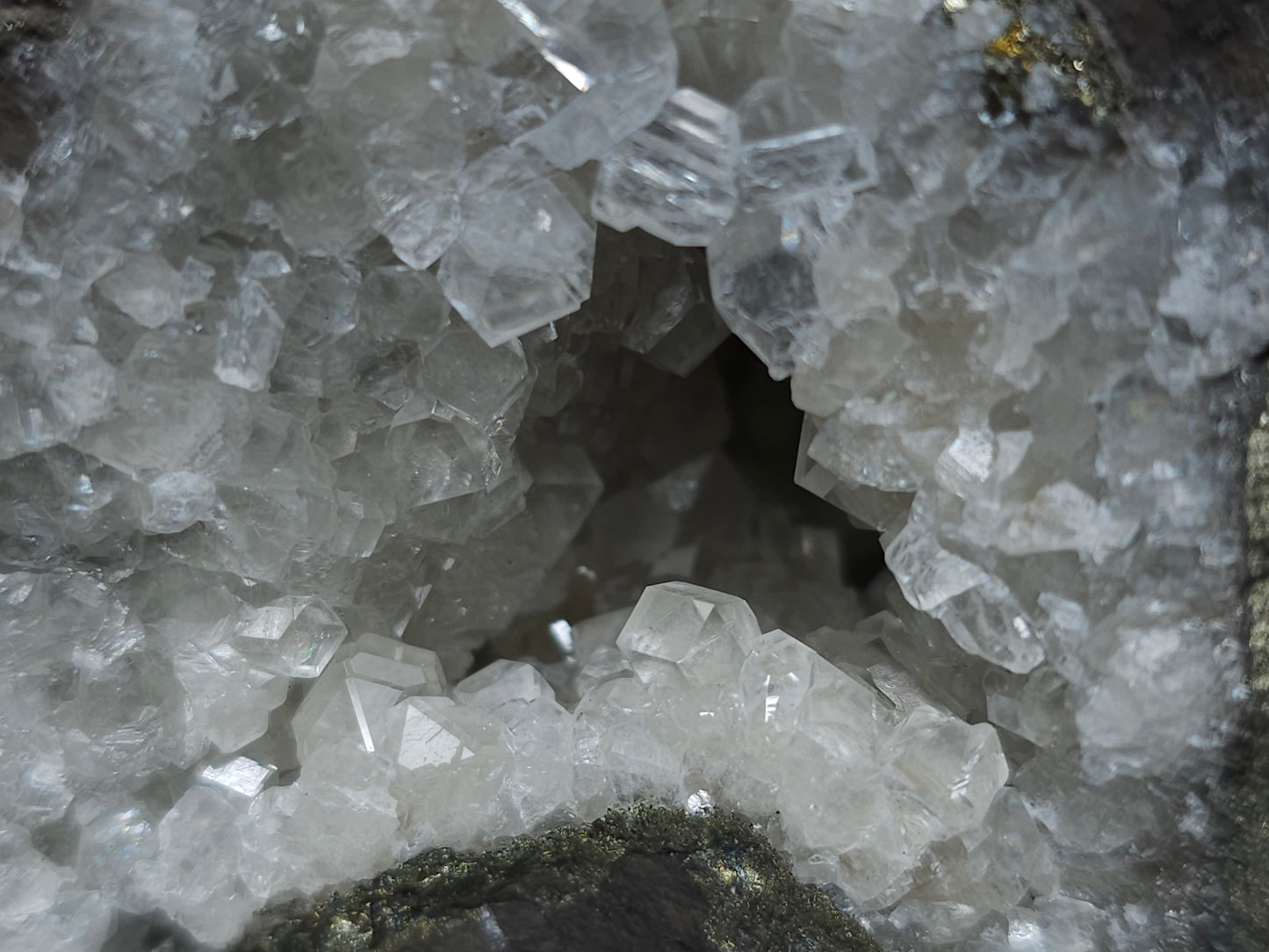 #33145 Super clear Nailhead Spar Calcite geode with Chalcopyrite ore and multiple small fossils in the matrix