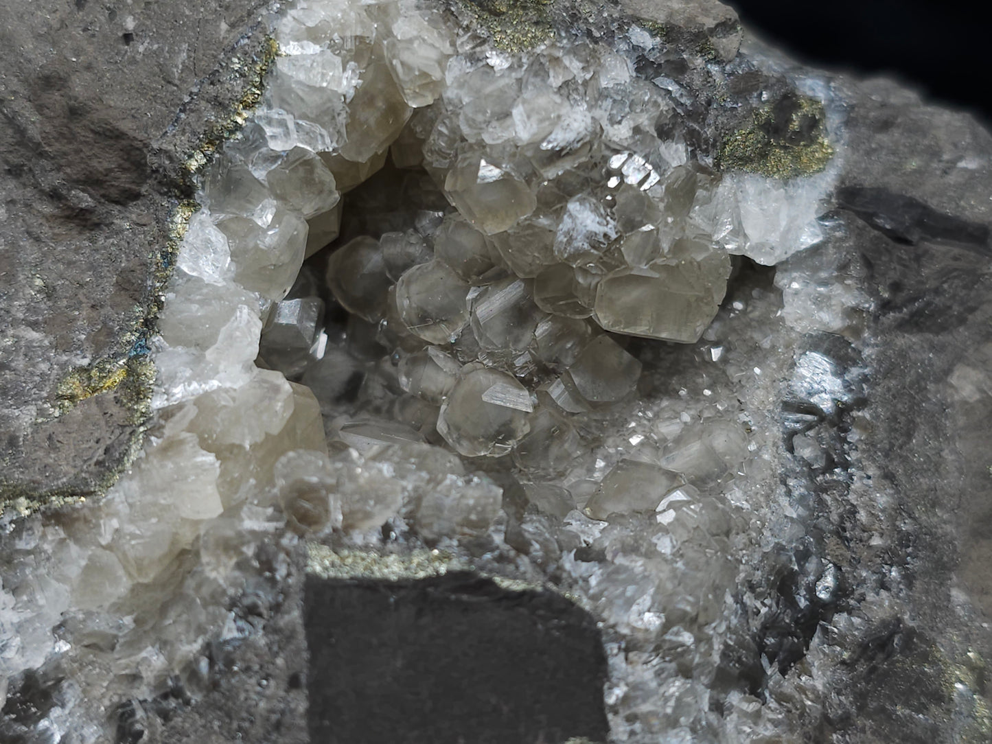 #33145 Super clear Nailhead Spar Calcite geode with Chalcopyrite ore and multiple small fossils in the matrix