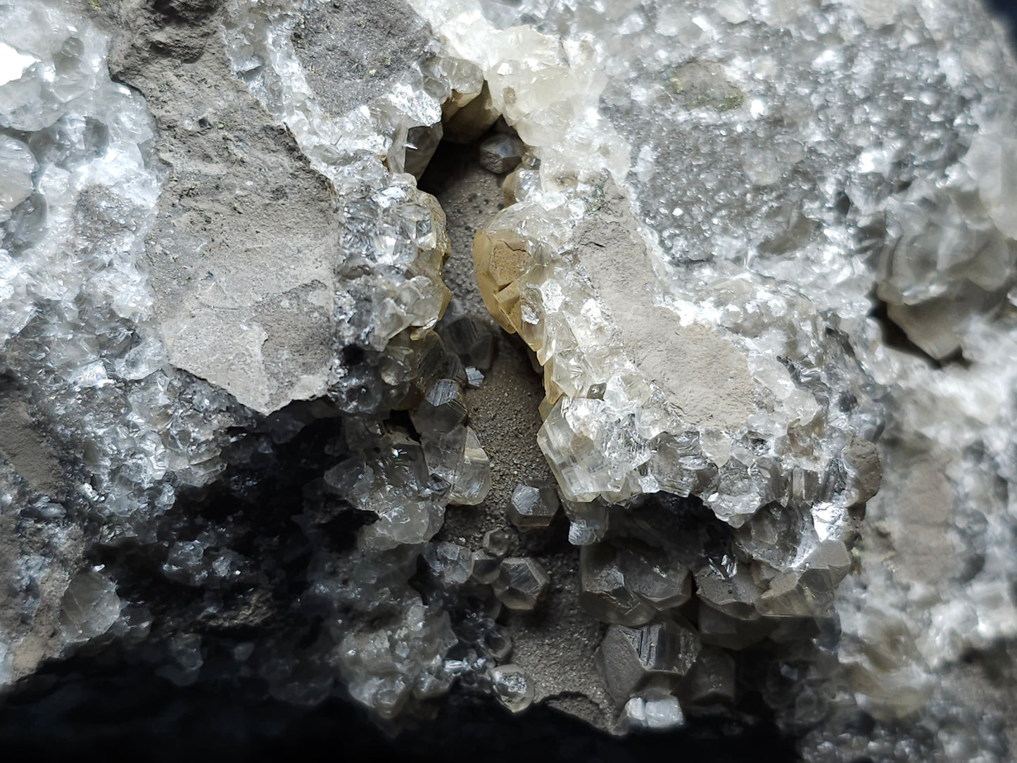 #33148 Super clear Nailhead Spar Calcite cluster with Chalcopyrite ore and multiple small fossils in the matrix