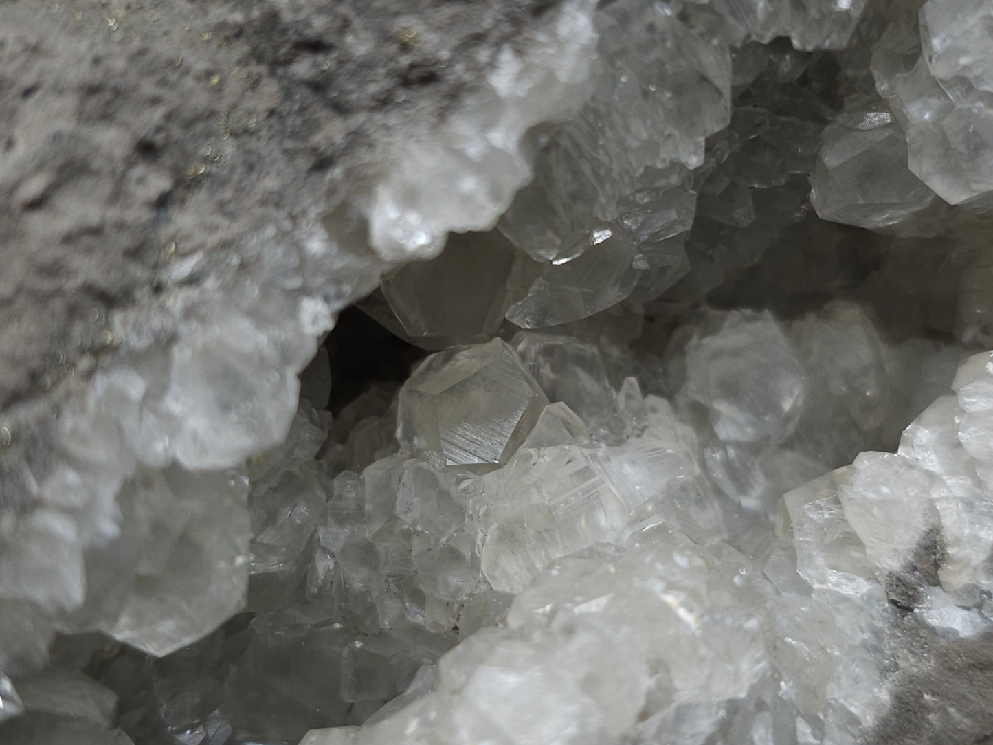 #33137 Super clear Nailhead Spar Calcite geode with Chalcopyrite ore and multiple small fossils in the matrix