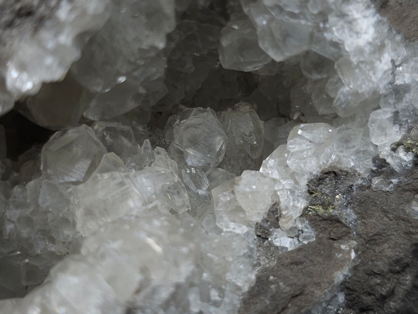 #33137 Super clear Nailhead Spar Calcite geode with Chalcopyrite ore and multiple small fossils in the matrix