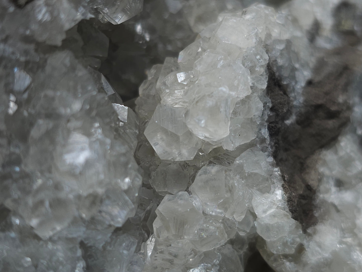#33137 Super clear Nailhead Spar Calcite geode with Chalcopyrite ore and multiple small fossils in the matrix
