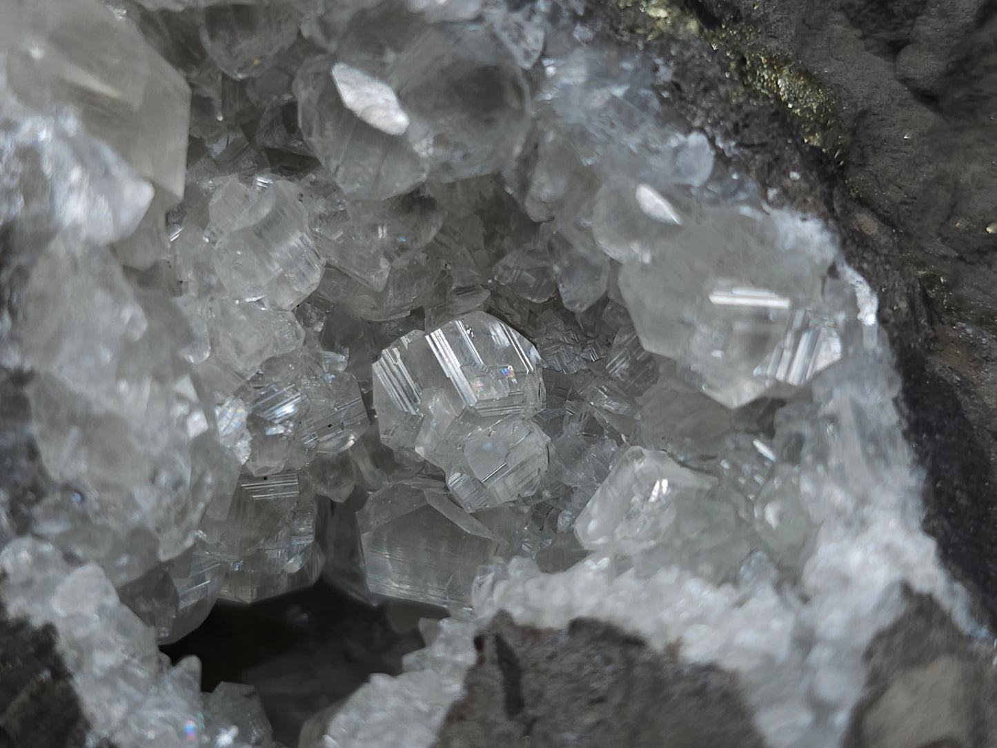 #33136 Super clear Nailhead Spar Calcite geode with Chalcopyrite ore and multiple small fossils in the matrix
