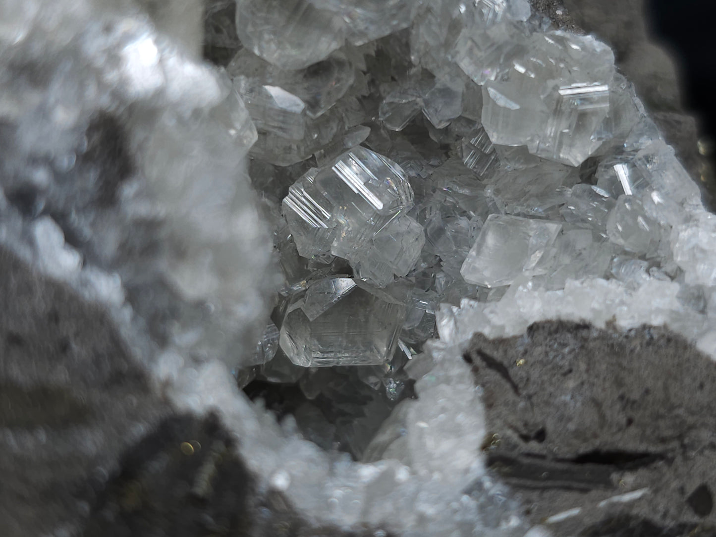 #33136 Super clear Nailhead Spar Calcite geode with Chalcopyrite ore and multiple small fossils in the matrix