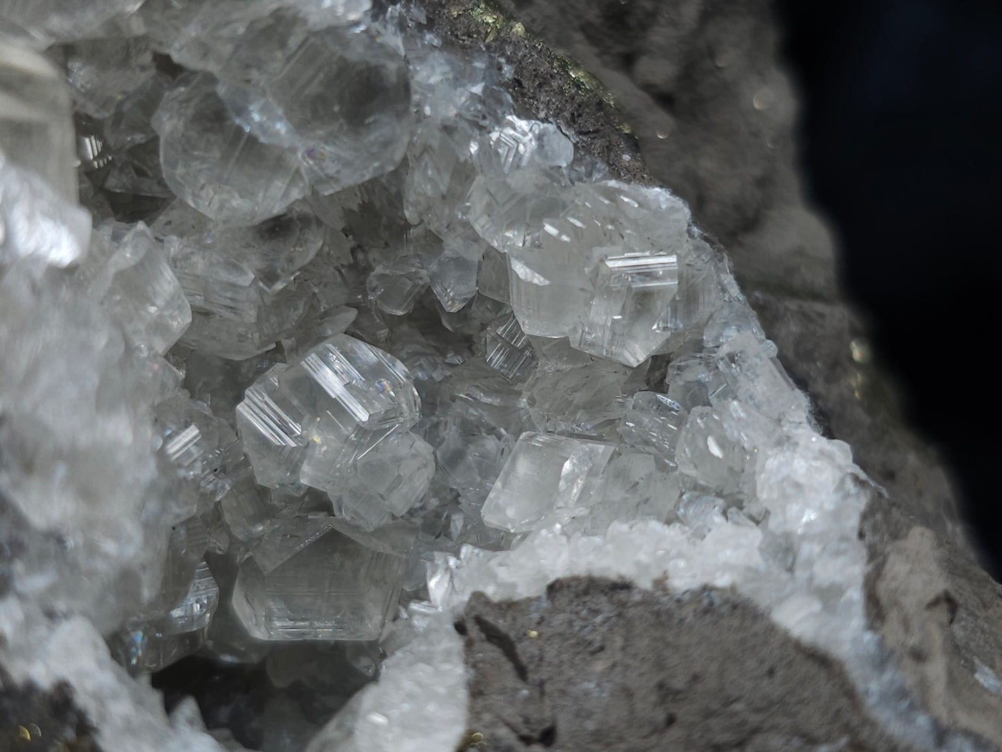 #33136 Super clear Nailhead Spar Calcite geode with Chalcopyrite ore and multiple small fossils in the matrix