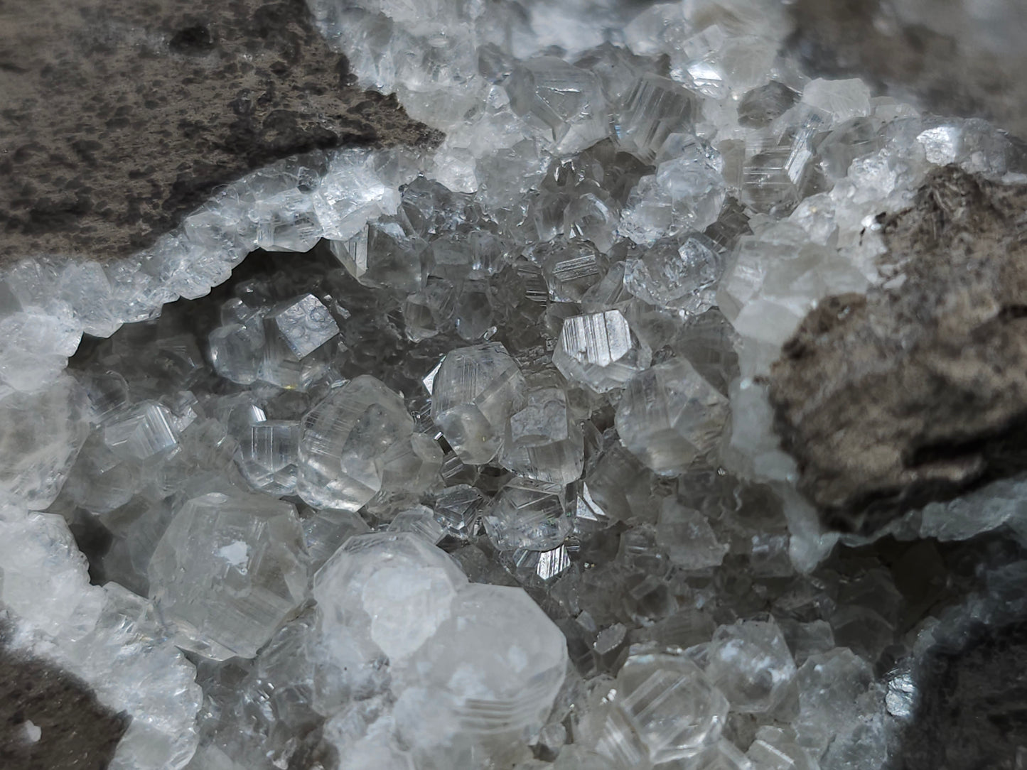 #33151 Super clear Nailhead Spar Calcite geode with Chalcopyrite ore and multiple small fossils in the matrix