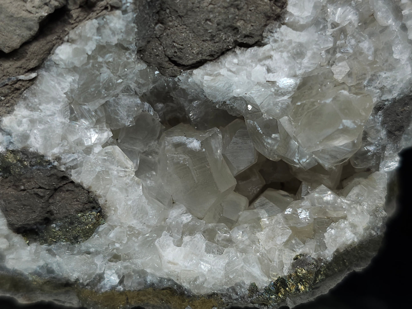 #33156 Super clear Nailhead Spar Calcite geode with Chalcopyrite ore and multiple small fossils in the matrix