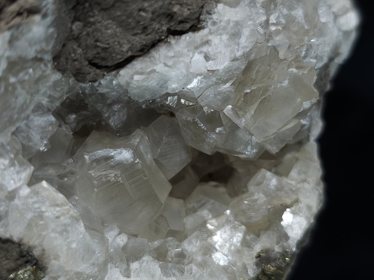 #33156 Super clear Nailhead Spar Calcite geode with Chalcopyrite ore and multiple small fossils in the matrix