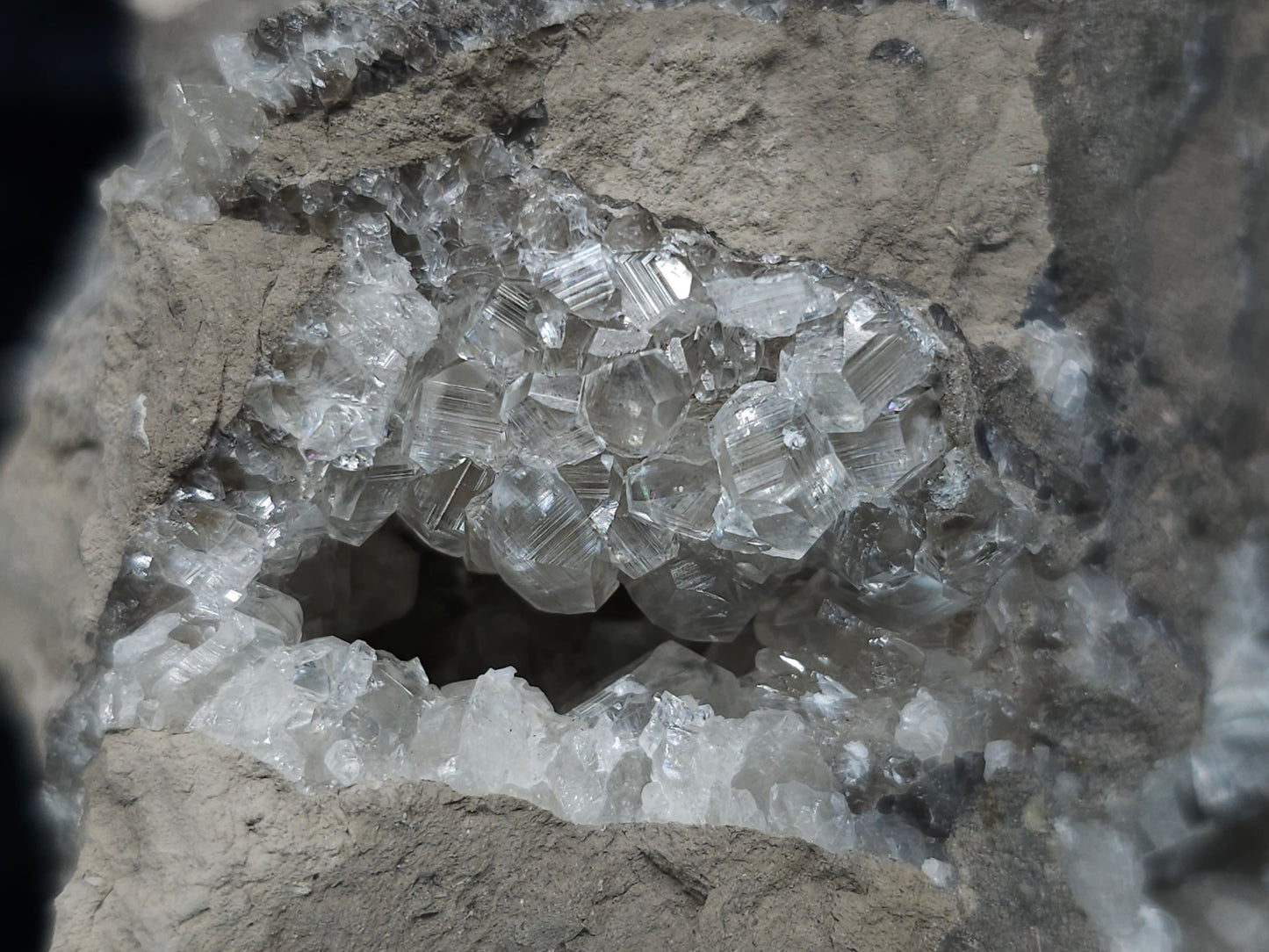 #33158 Super clear Nailhead Spar Calcite geode with Chalcopyrite ore and multiple small fossils in the matrix