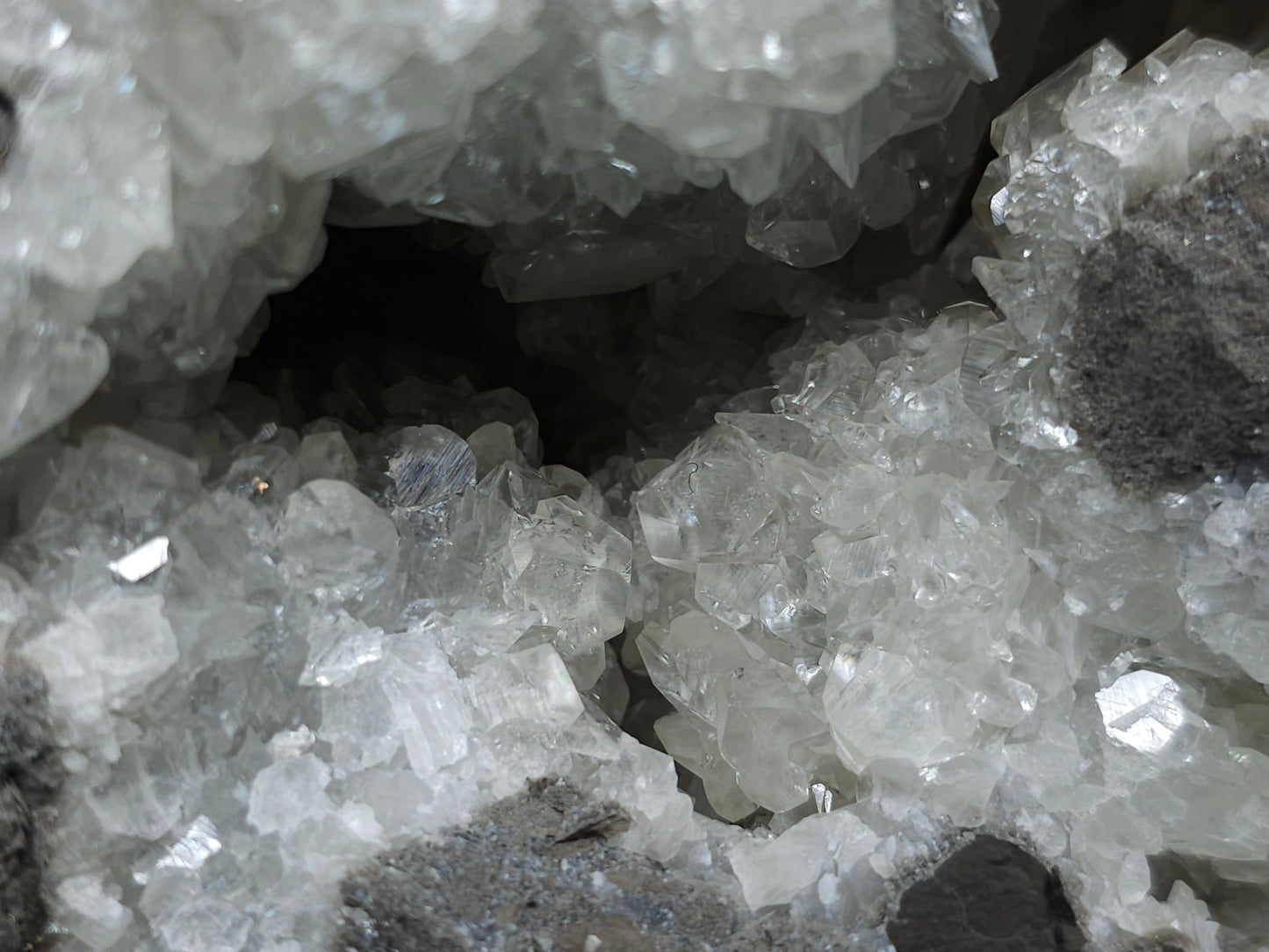 #33161 Super clear Nailhead Spar Calcite geode with Chalcopyrite ore and multiple small fossils in the matrix